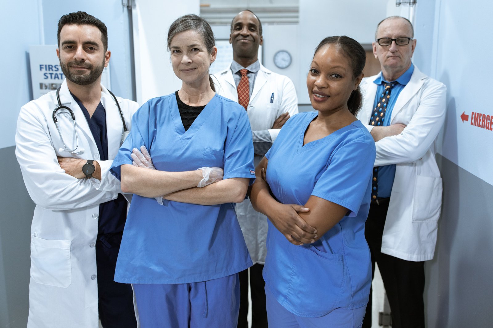 Nurse working with a healthcare team in a clinical setting